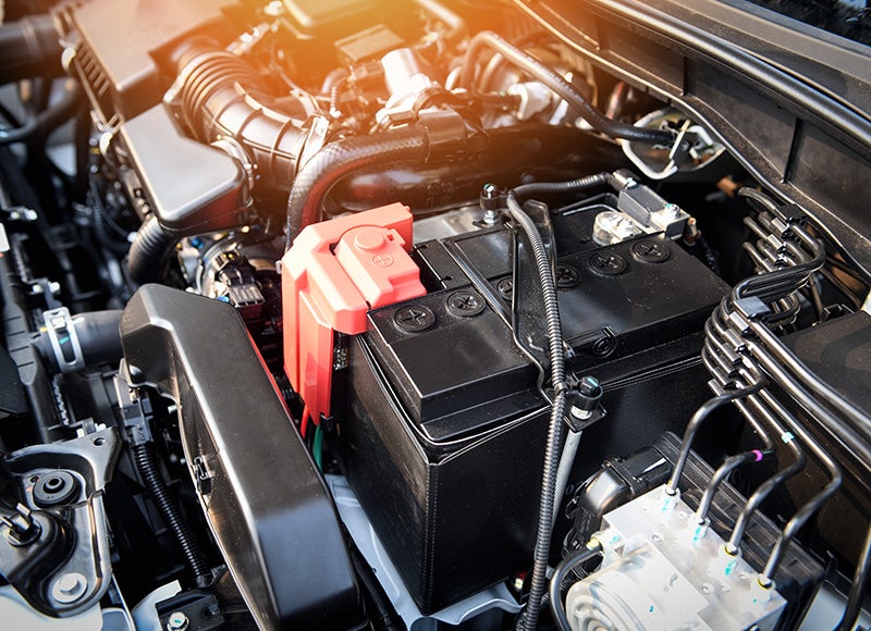 Car Battery and other parts under the hood
